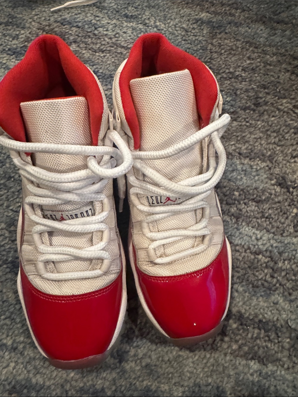 Air Jordan’s 11 Retro cherry White and Red High-Top Sneakers